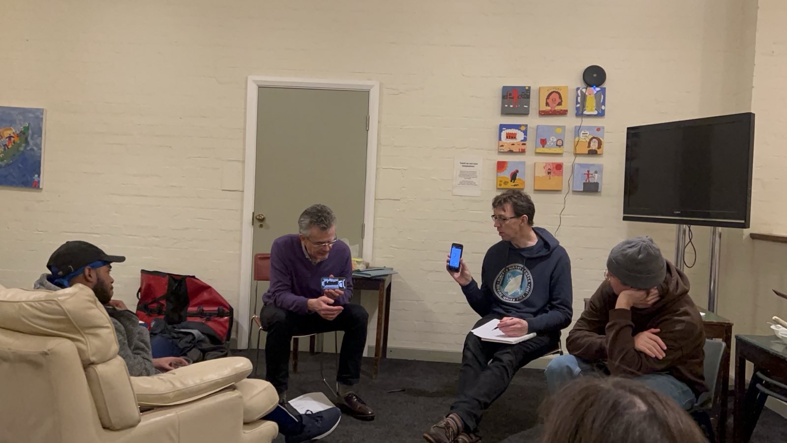 EcoCounts Mondays Gas Boilers Workshop attendees and speakers discussing which is the best app to see what the current UK energy mix is.