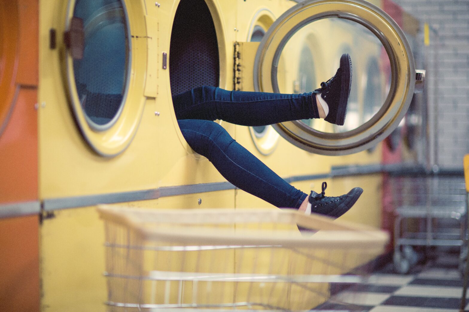 Someone falling into a laundromat washing machine - image by Pexels from Pixabay