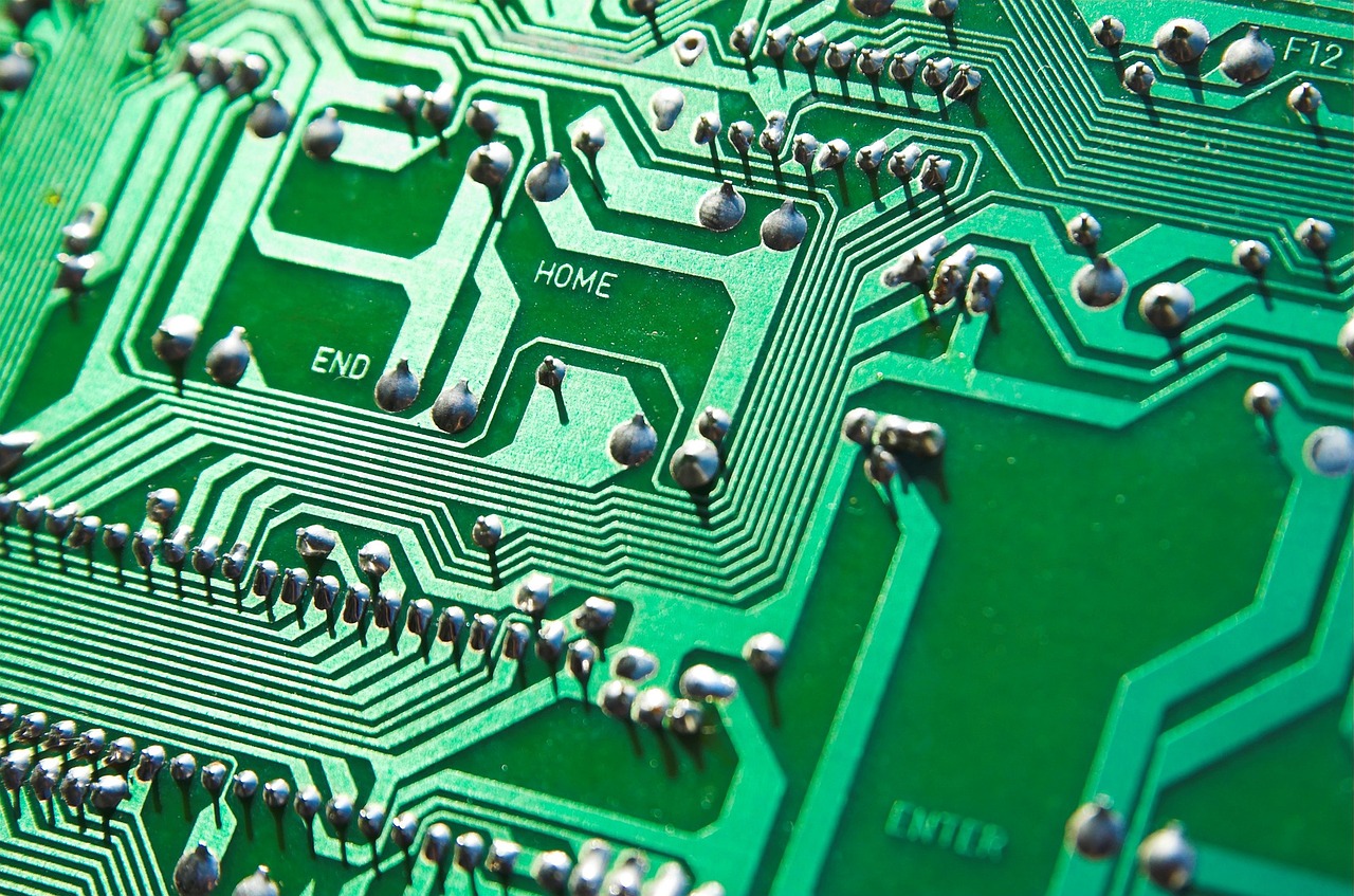 a close-up of a green circuit board